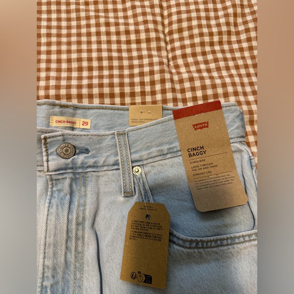 Levi’s high rise cinch baggy jeans size 29 color never going to change